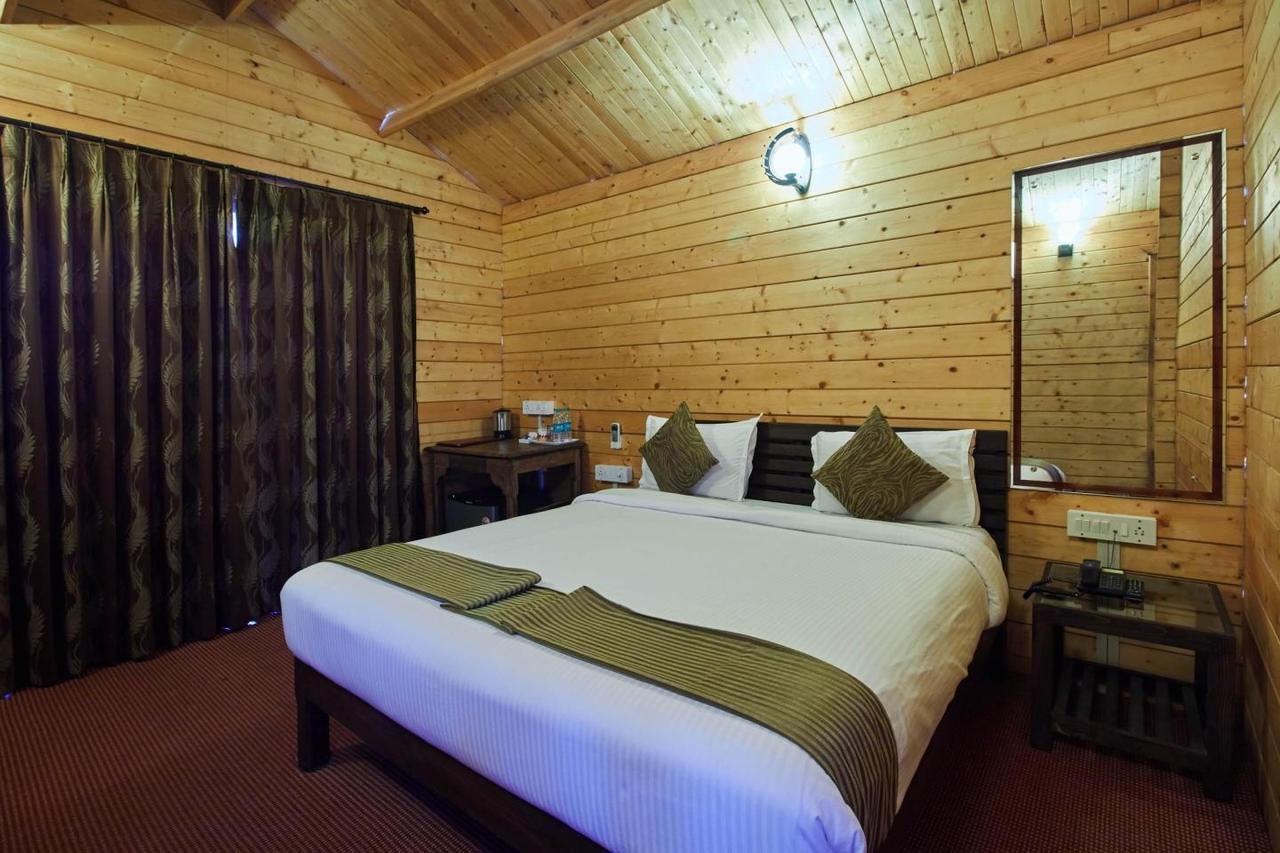 Tiara Fiesta Beach Cottages Morjim Exterior photo