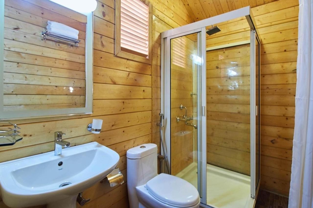 Tiara Fiesta Beach Cottages Morjim Exterior photo